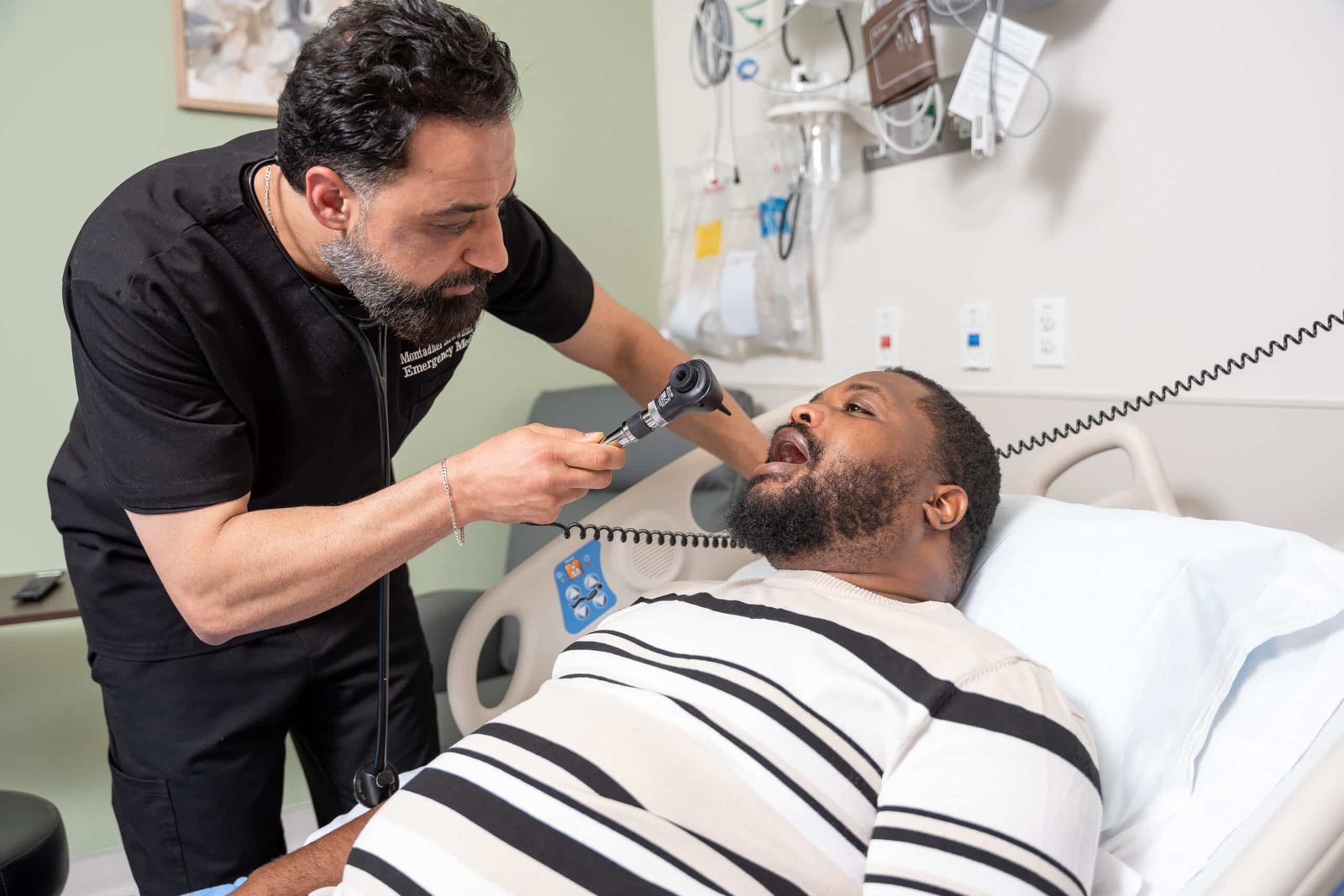Doctor Examining Patient Priority Emergency Center Austin TX