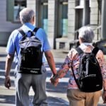 Older couple holding hands outdoors, a reminder of protecting seniors and infants during severe Austin weather swings